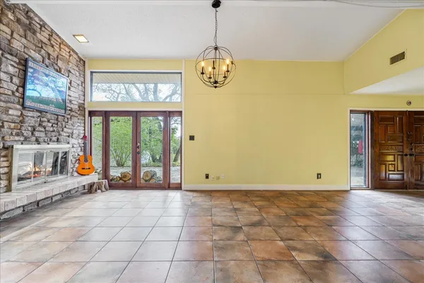 a view of an entryway with a wooden door
