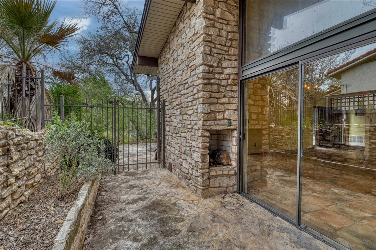 209 Finn Street Austin, TX 78734 - Photo 10 of 40 Access to yard from sliding door connected from the living room