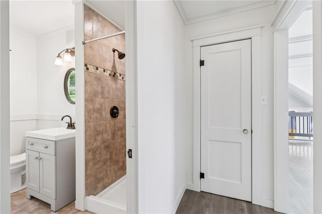 3425 Mercer Road New Castle, PA 16105 - Photo 25 of 38 a bathroom with a shower and a sink