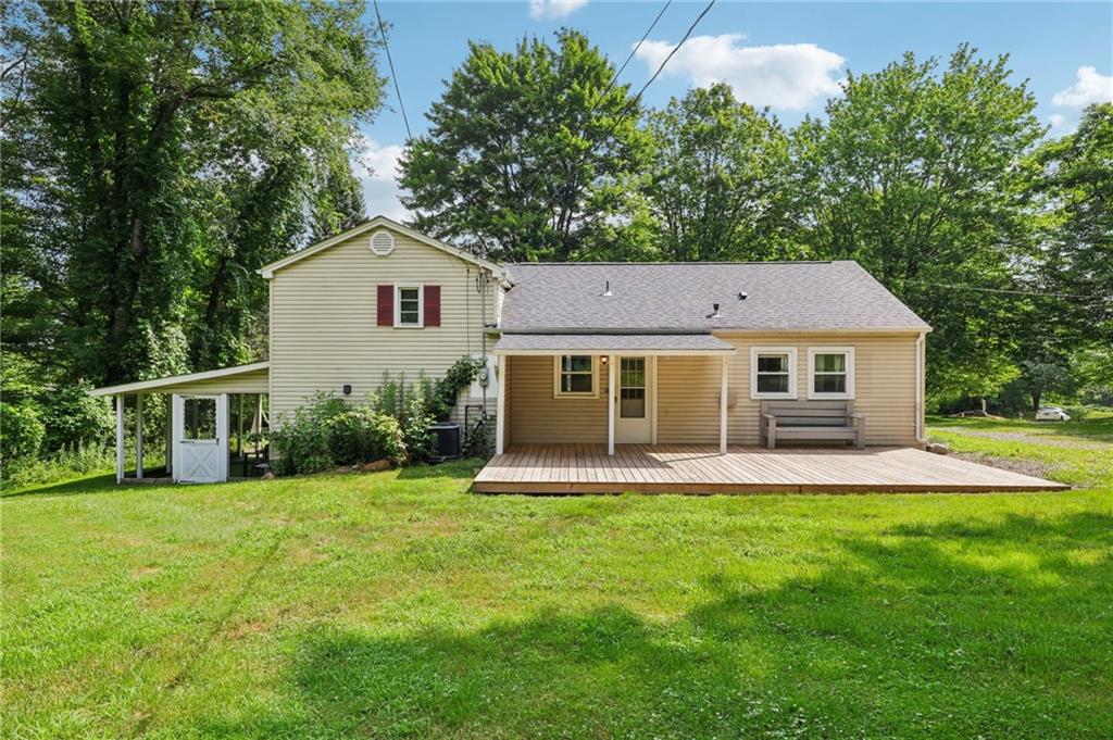 3425 Mercer Road New Castle, PA 16105 - Photo 31 of 38 a front view of a house with a yard and trees