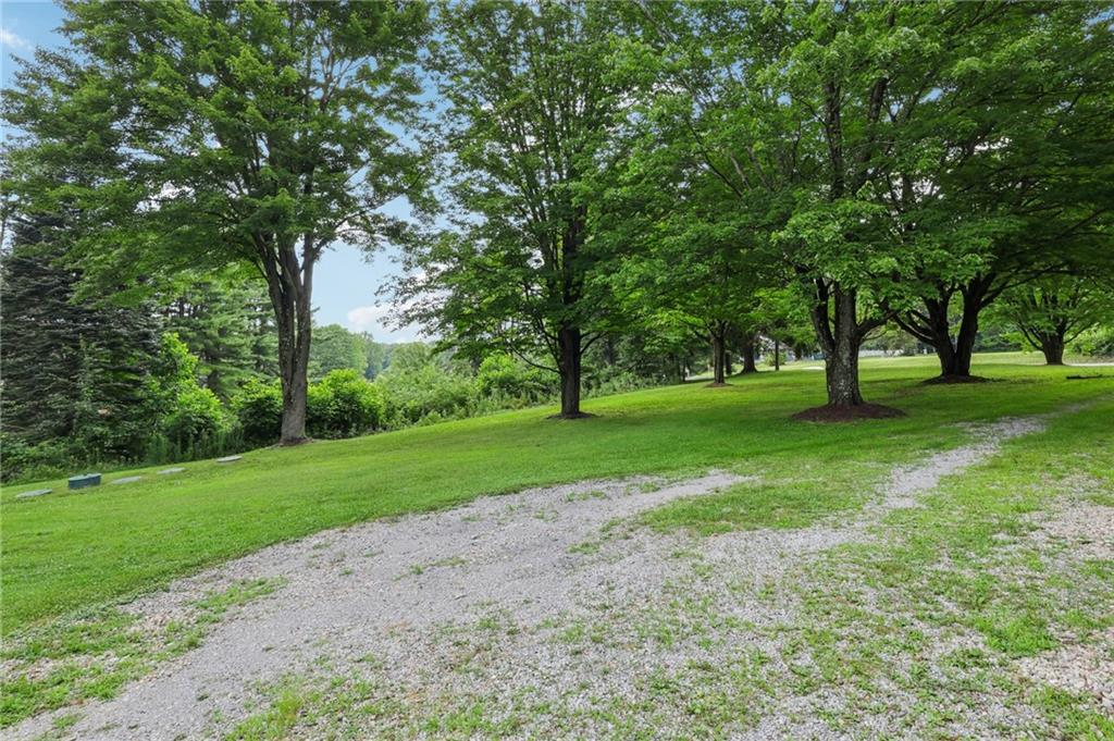 3425 Mercer Road New Castle, PA 16105 - Photo 32 of 38 a view of grassy field with benches