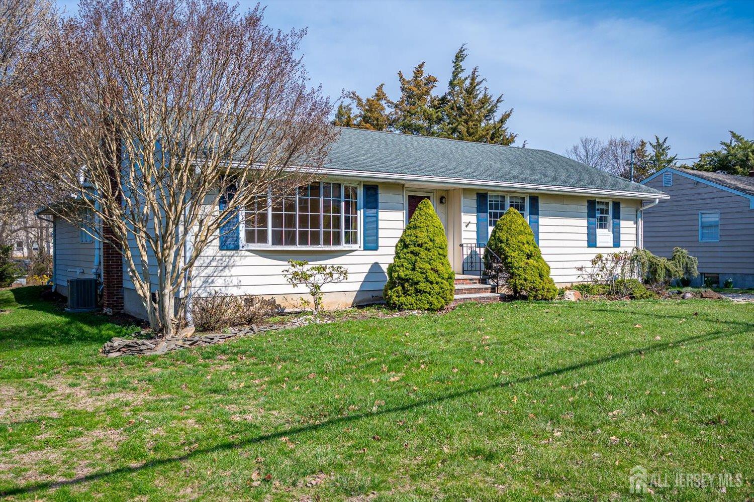17 Bartha Avenue Edison, NJ 08817 - Photo 1 of 25 front view of a house with a yard