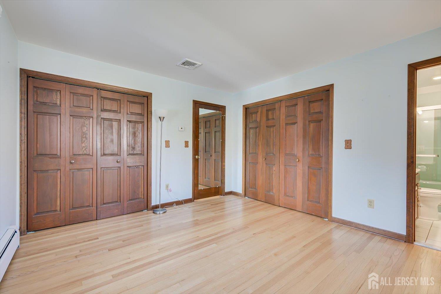 17 Bartha Avenue Edison, NJ 08817 - Photo 14 of 25 a view of empty room with wooden floor