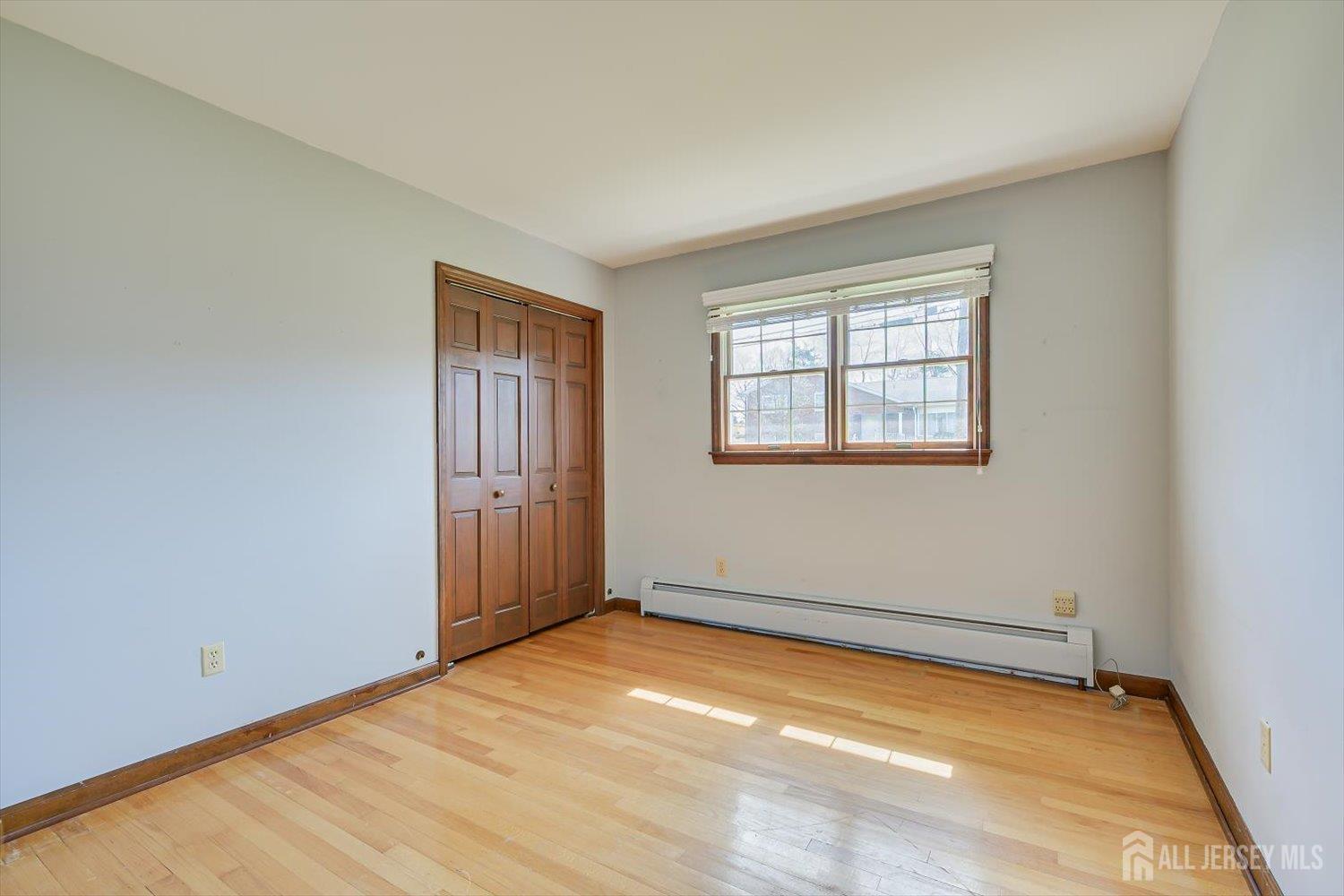 17 Bartha Avenue Edison, NJ 08817 - Photo 17 of 25 an empty room with a window