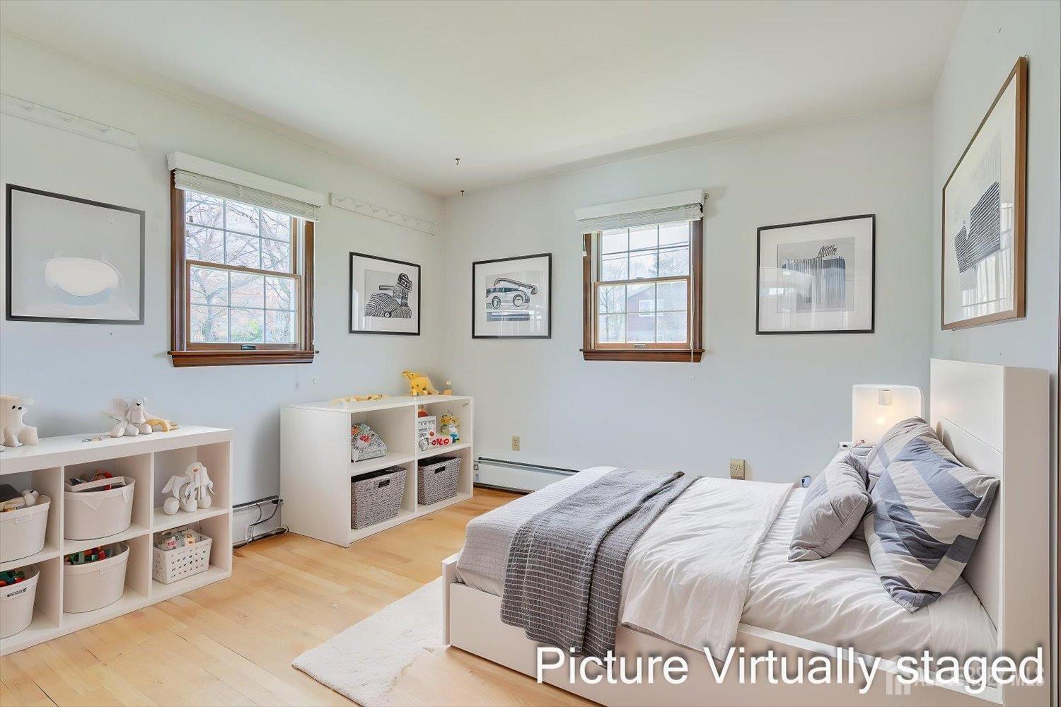 17 Bartha Avenue Edison, NJ 08817 - Photo 18 of 25 a bedroom with a bed and a cabinets