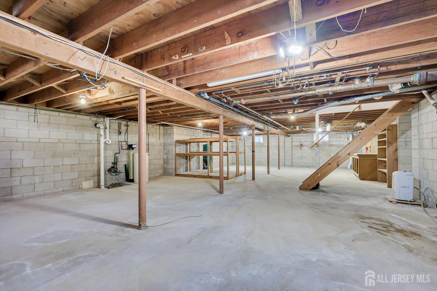 17 Bartha Avenue Edison, NJ 08817 - Photo 21 of 25 a view of an empty room with stairs