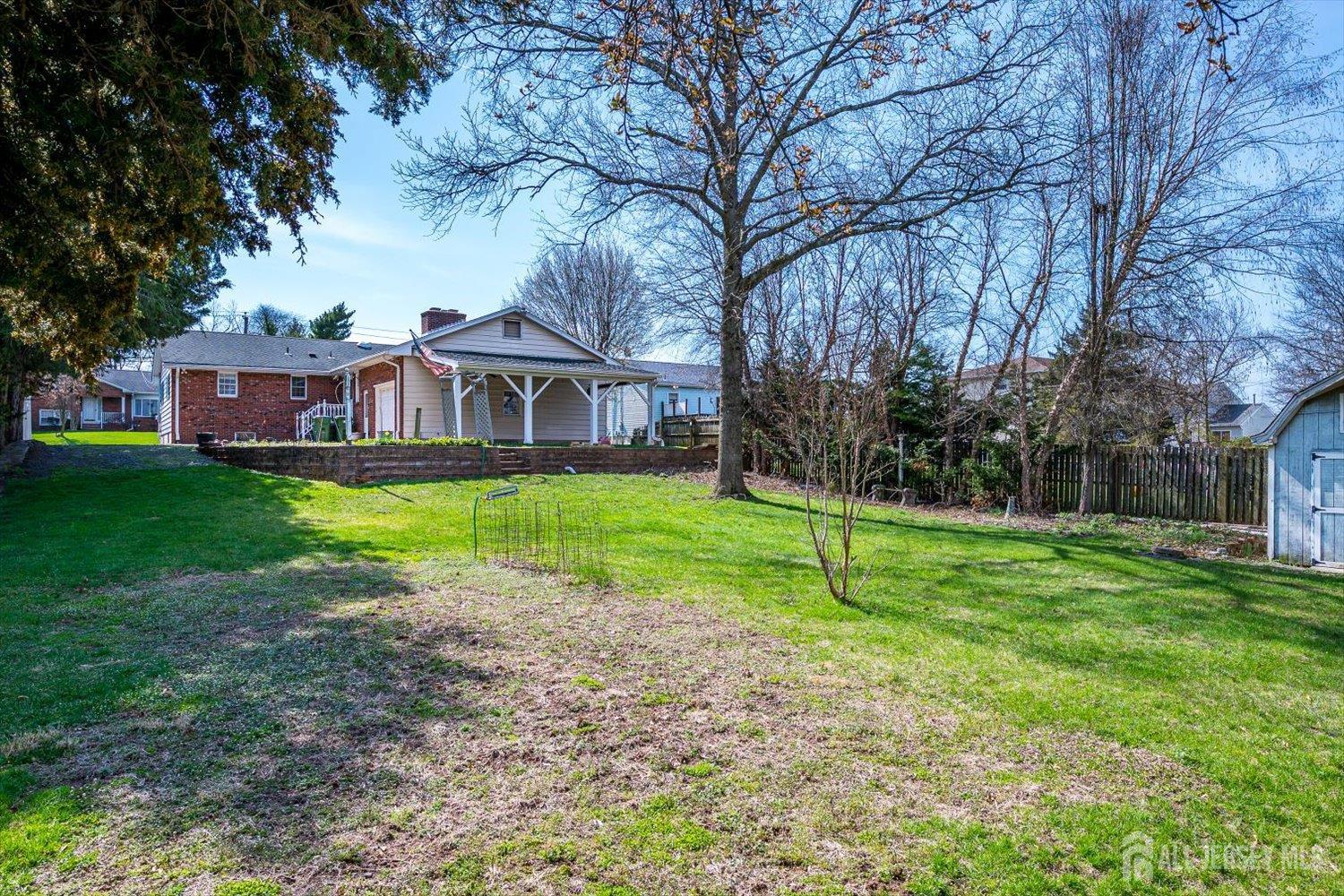 17 Bartha Avenue Edison, NJ 08817 - Photo 22 of 25 a view of a house with a yard