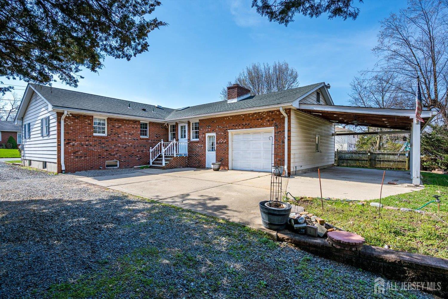 17 Bartha Avenue Edison, NJ 08817 - Photo 3 of 25 a front view of a house with garden