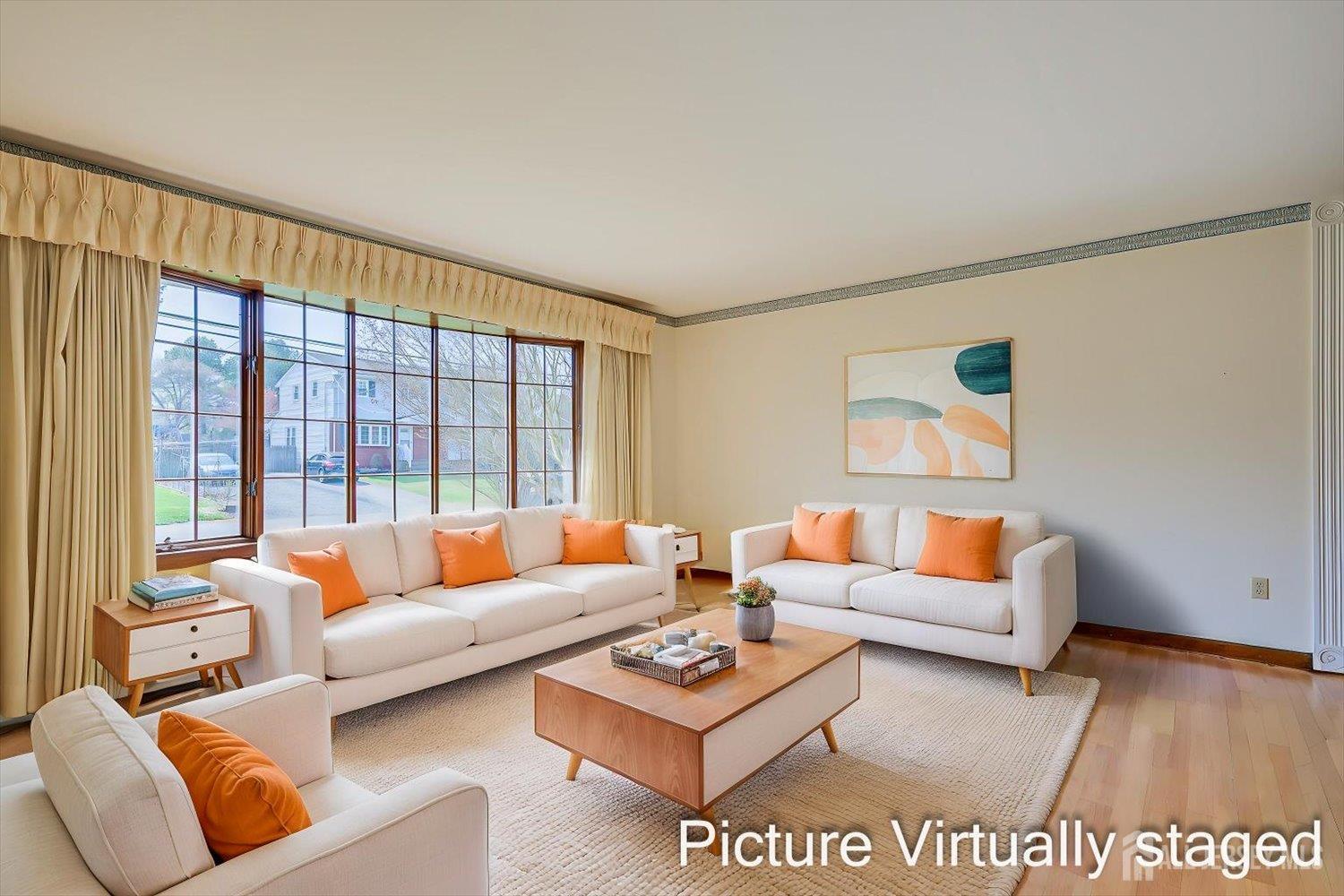17 Bartha Avenue Edison, NJ 08817 - Photo 6 of 25 a living room with furniture and a large window