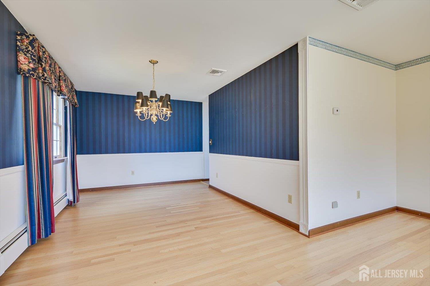 17 Bartha Avenue Edison, NJ 08817 - Photo 7 of 25 a view of an empty room with a window