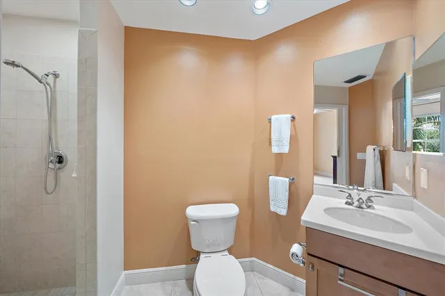 an aerial view of a house with a lake view