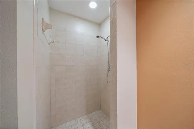 an aerial view of a house with a lake view