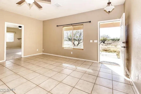 a view of an empty room and window