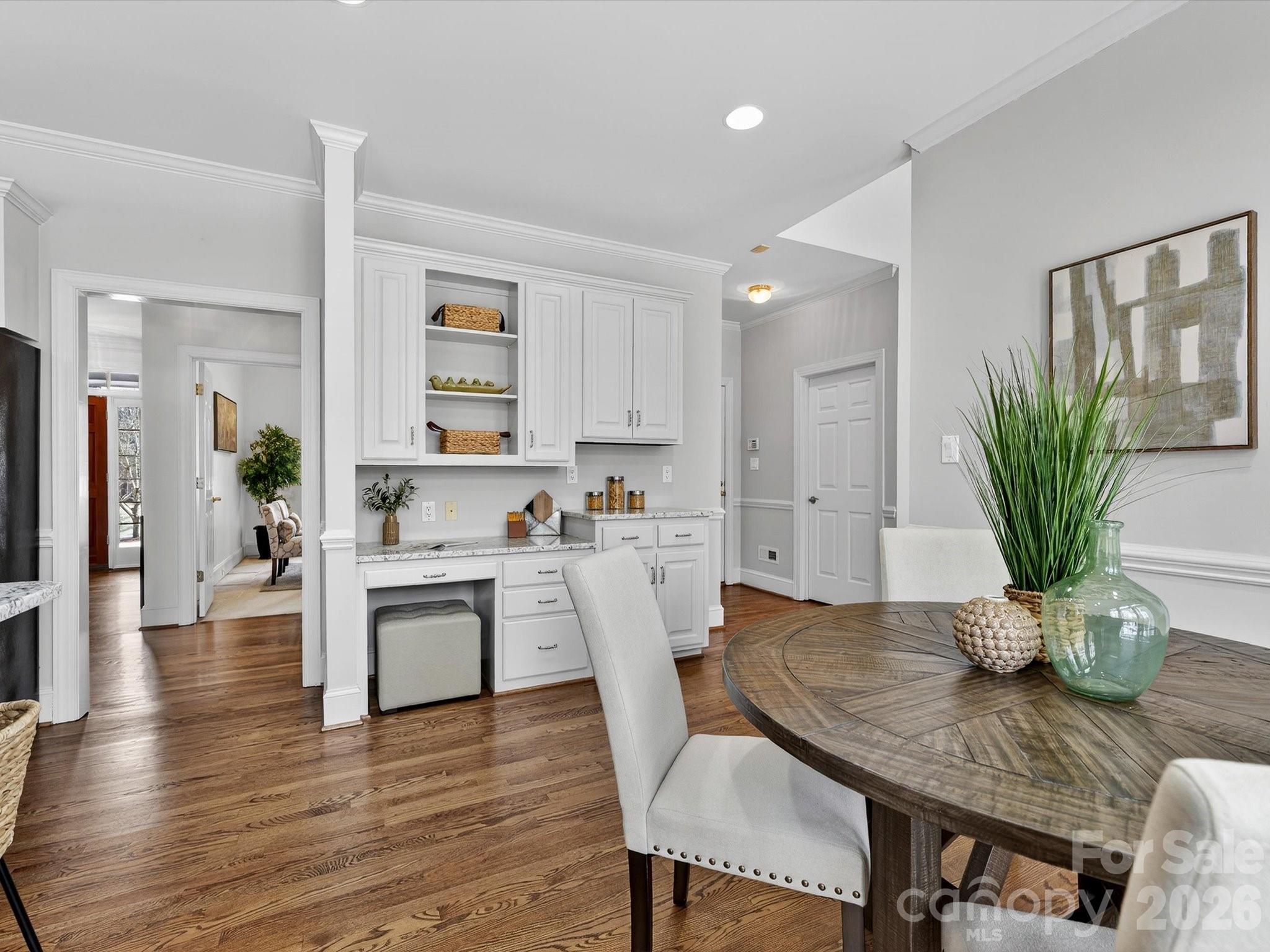 13417 Scanlan Way Davidson, NC 28036 - Photo 16 of 48 a view of kitchen with cabinets and wooden floor