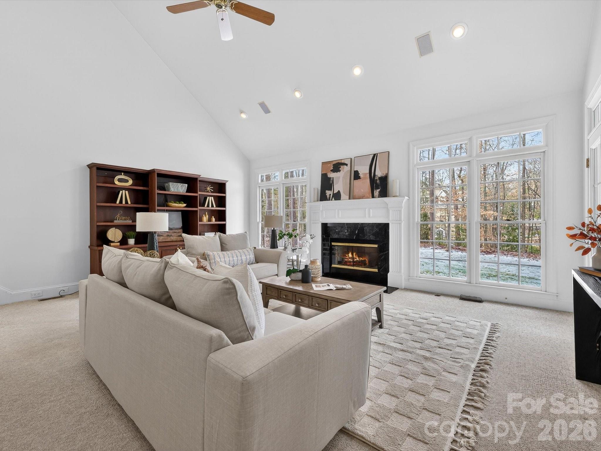 13417 Scanlan Way Davidson, NC 28036 - Photo 17 of 48 a living room with furniture and a fireplace