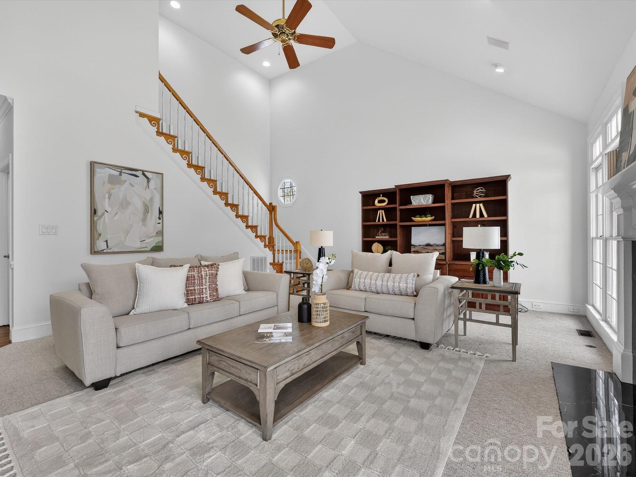 13417 Scanlan Way Davidson, NC 28036 - Photo 20 of 48 a living room with furniture and a potted plant