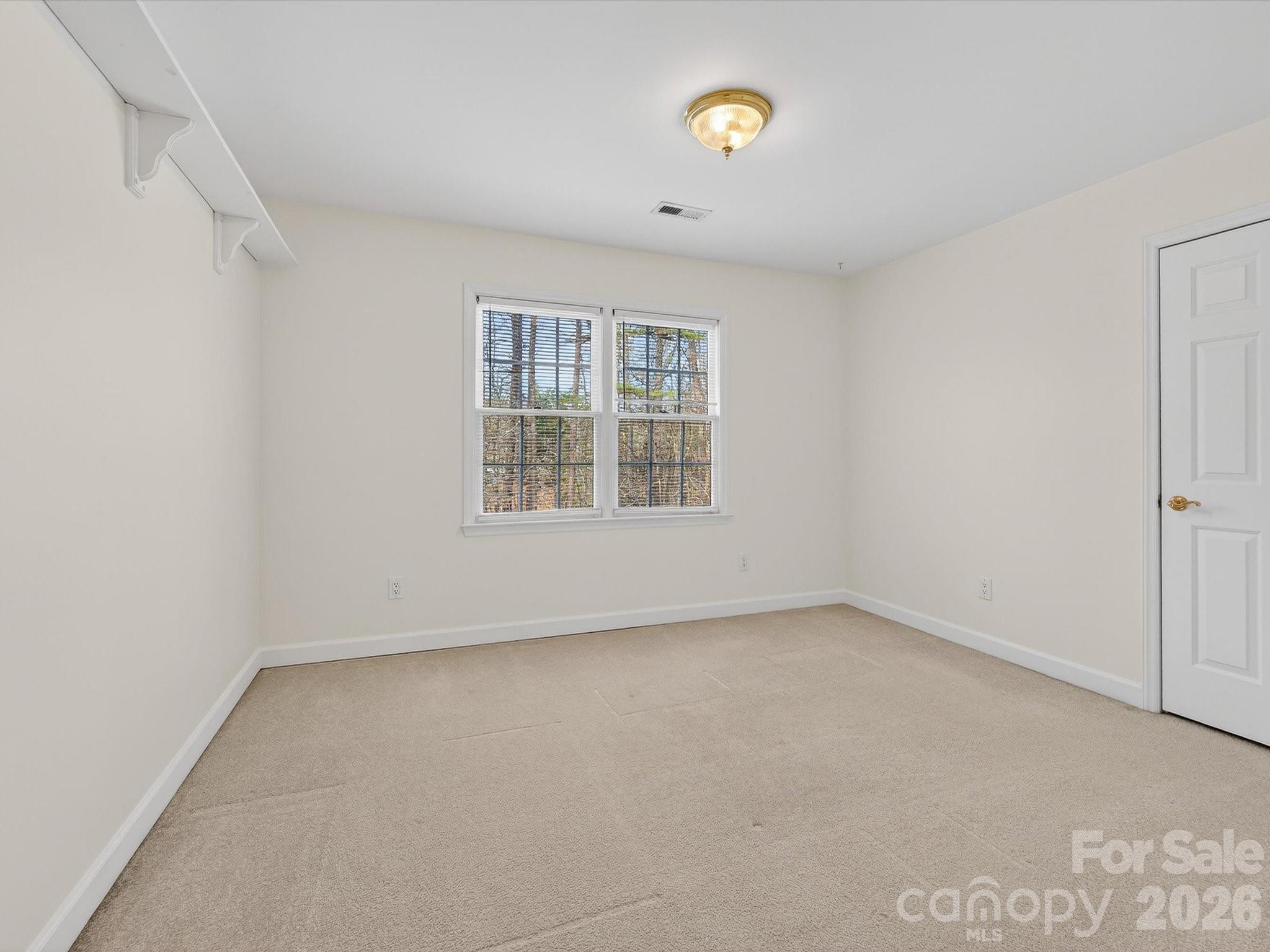 13417 Scanlan Way Davidson, NC 28036 - Photo 31 of 48 an empty room with a window