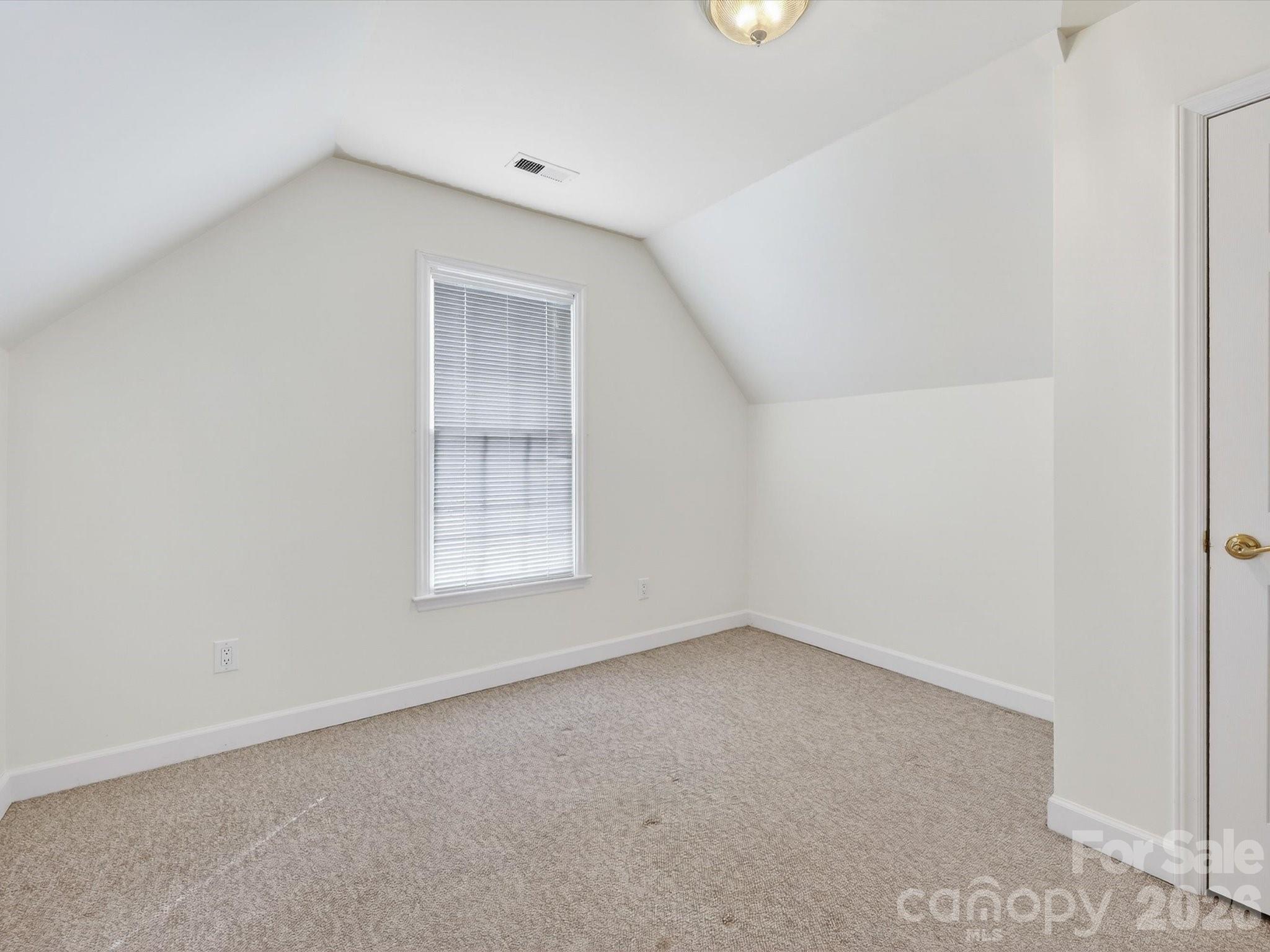 13417 Scanlan Way Davidson, NC 28036 - Photo 34 of 48 an empty room with a window