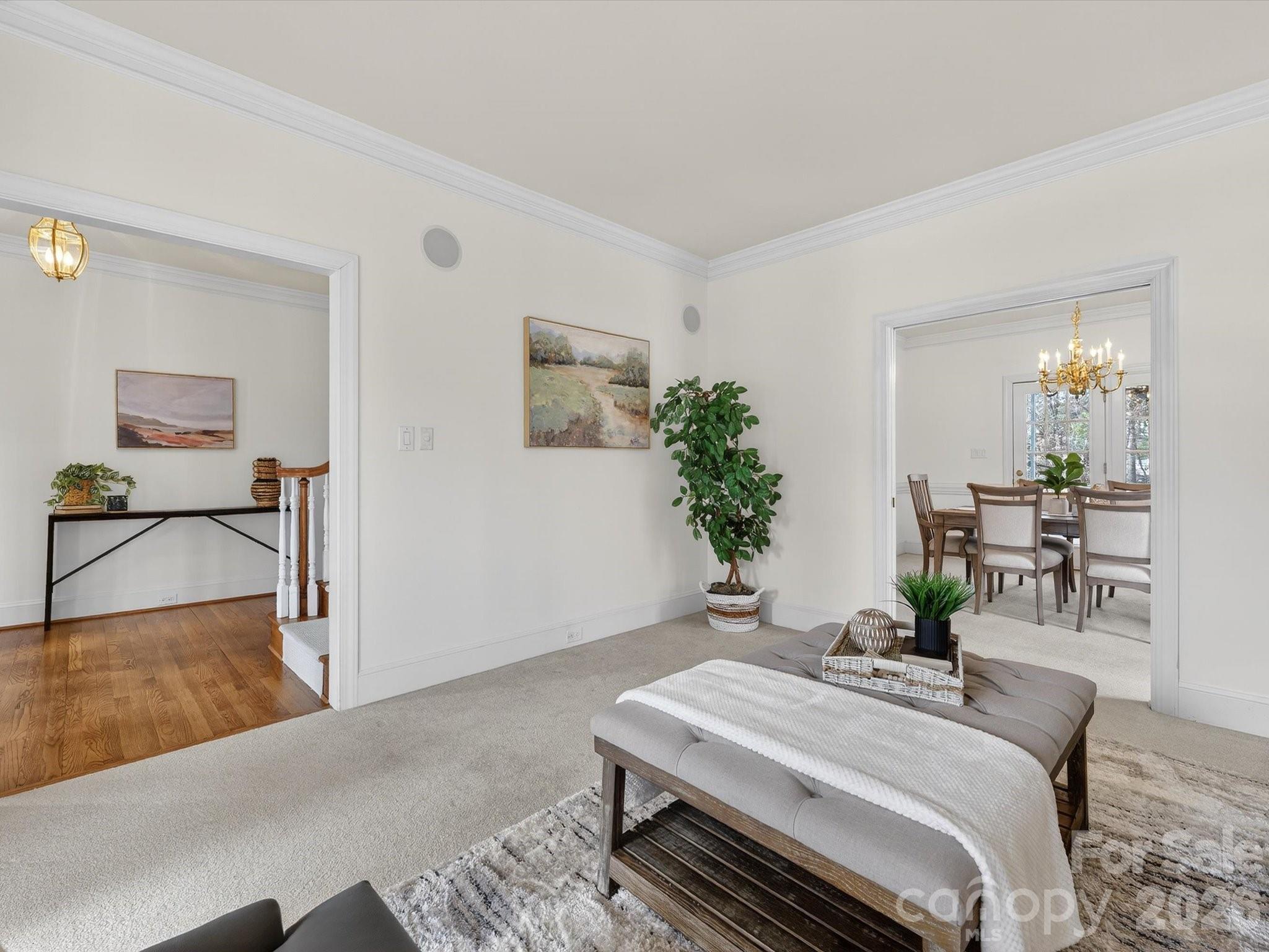 13417 Scanlan Way Davidson, NC 28036 - Photo 6 of 48 a bed room with a bed and a potted plant