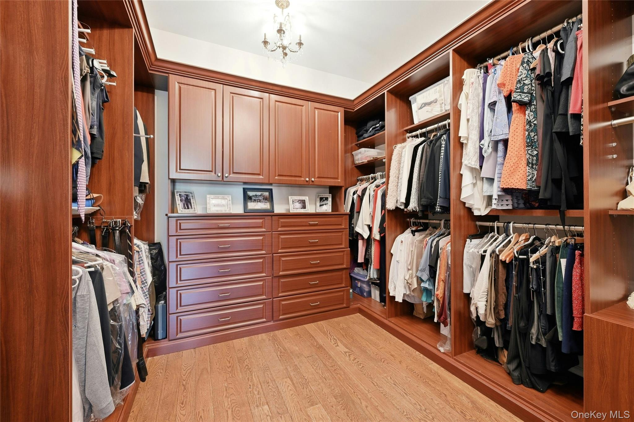 5 Mill Road Lloyd Harbor, NY 11743 - Photo 24 of 49 a view of walk in closet with clothes and shoes
