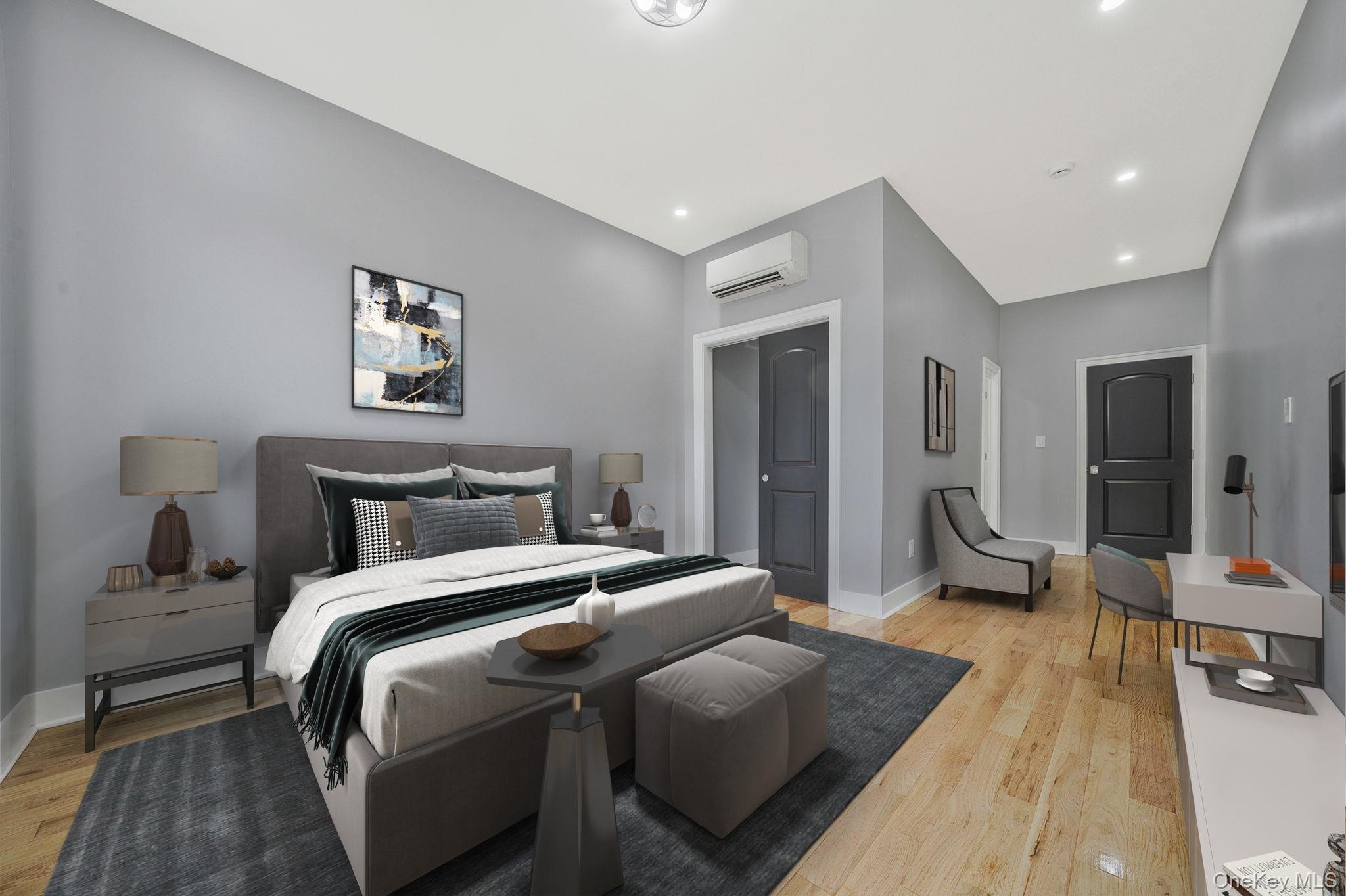 581 Decatur Street Brooklyn, NY 11233 - Photo 7 of 12 a bedroom with bed and a large mirror