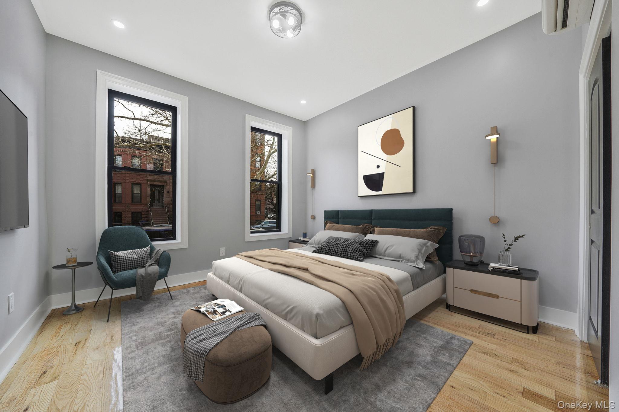 581 Decatur Street Brooklyn, NY 11233 - Photo 8 of 12 a bedroom with bed and window