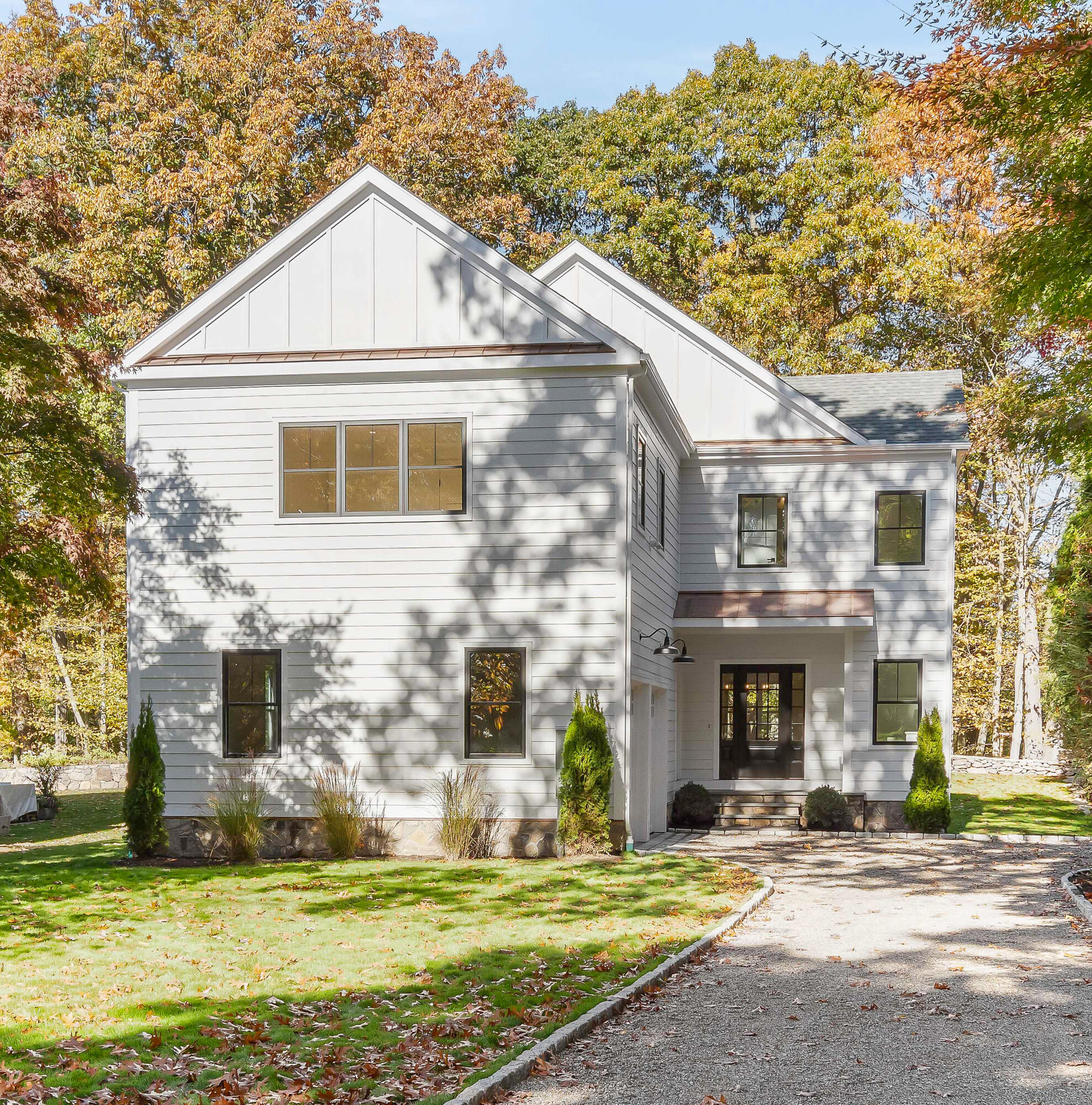 14 Edgewood Road Darien, CT 06820 - Photo 1 of 38 a front view of a house with a yard