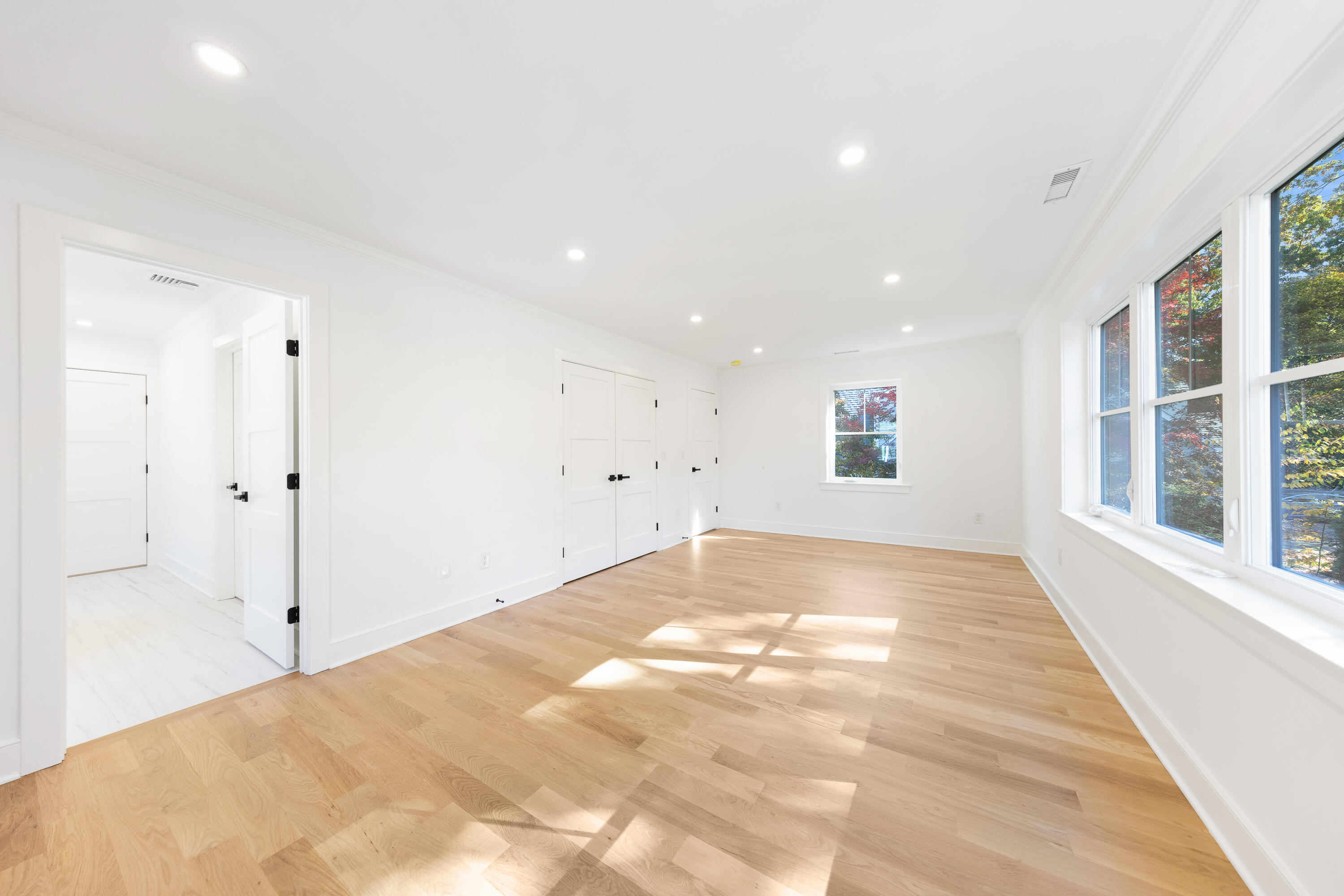 14 Edgewood Road Darien, CT 06820 - Photo 22 of 38 a view of a big room with closet and windows