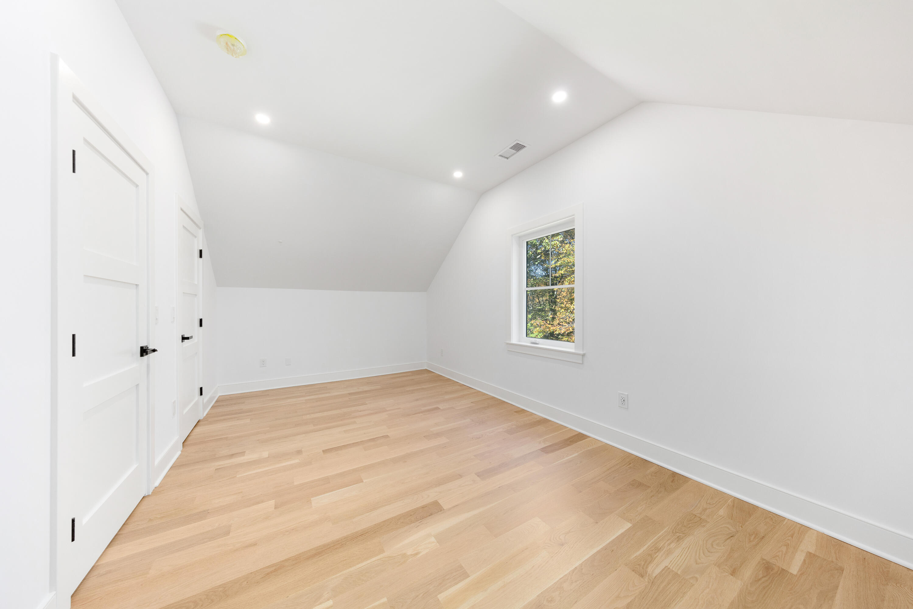 14 Edgewood Road Darien, CT 06820 - Photo 29 of 38 wooden floor in an empty room with a window