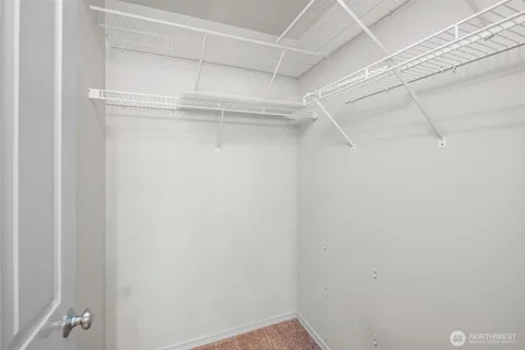 a view of an empty walk in closet