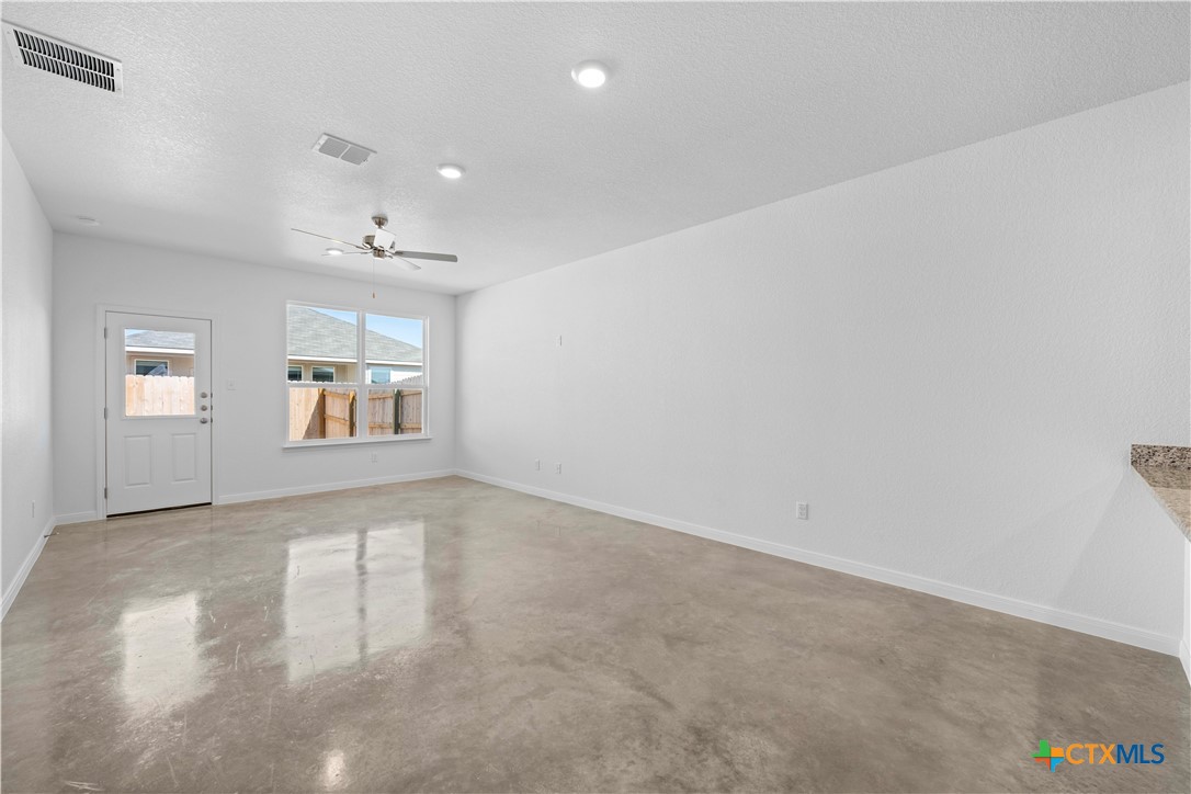 2819 Quail Rdg Lane Temple, TX 76501 - Photo 10 of 17 wooden floor in an empty room with a window