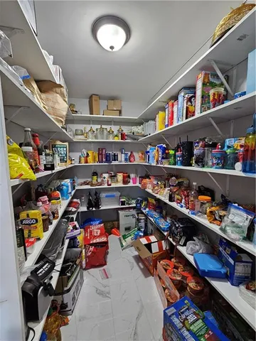 a room with storage and utility room