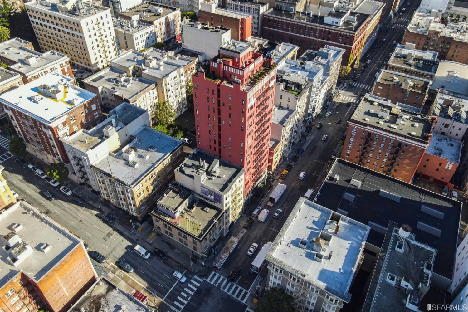 an aerial view of a building with a ocean view