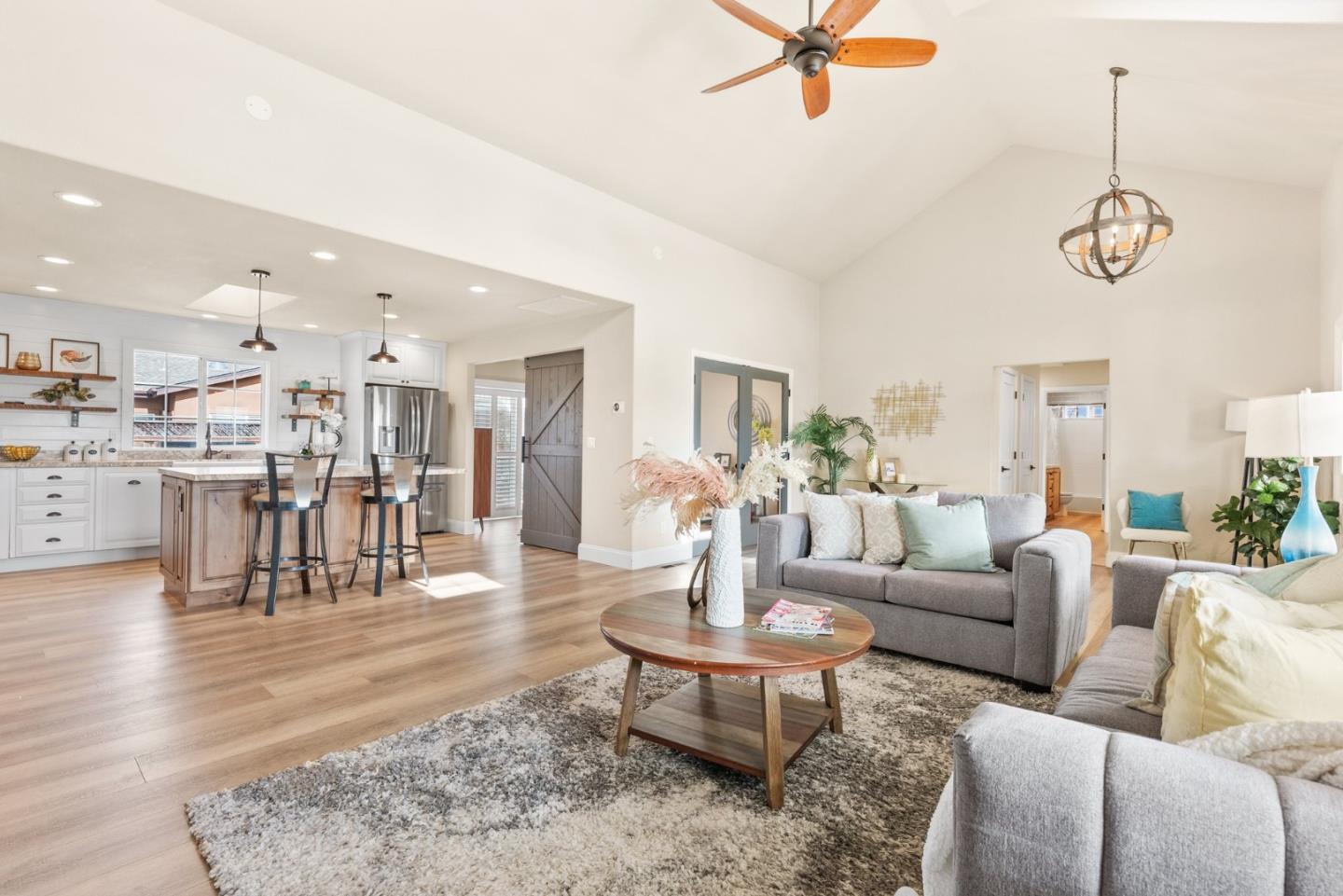 75 Paloma Drive Morgan Hill, CA 95037 - Photo 11 of 53 a living room with furniture kitchen view and a chandelier