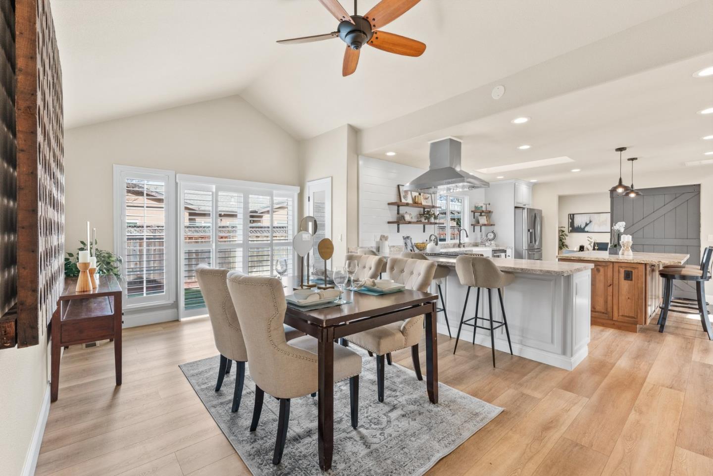 75 Paloma Drive Morgan Hill, CA 95037 - Photo 16 of 53 a view of a dining room with furniture window and wooden floor