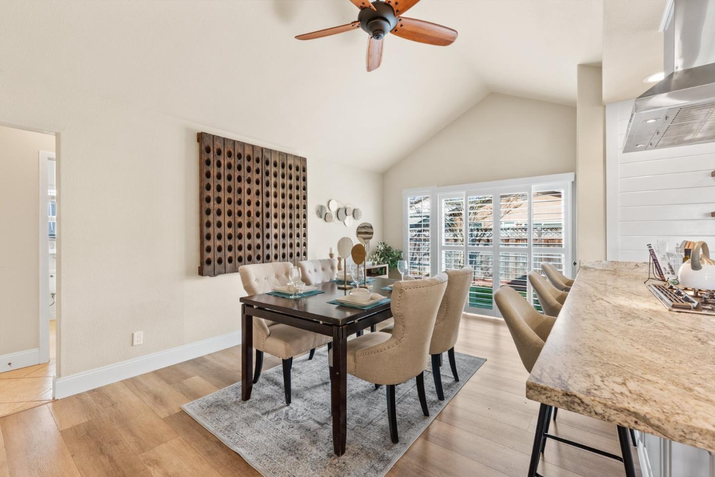 75 Paloma Drive Morgan Hill, CA 95037 - Photo 17 of 53 a view of a dining room with furniture window and wooden floor