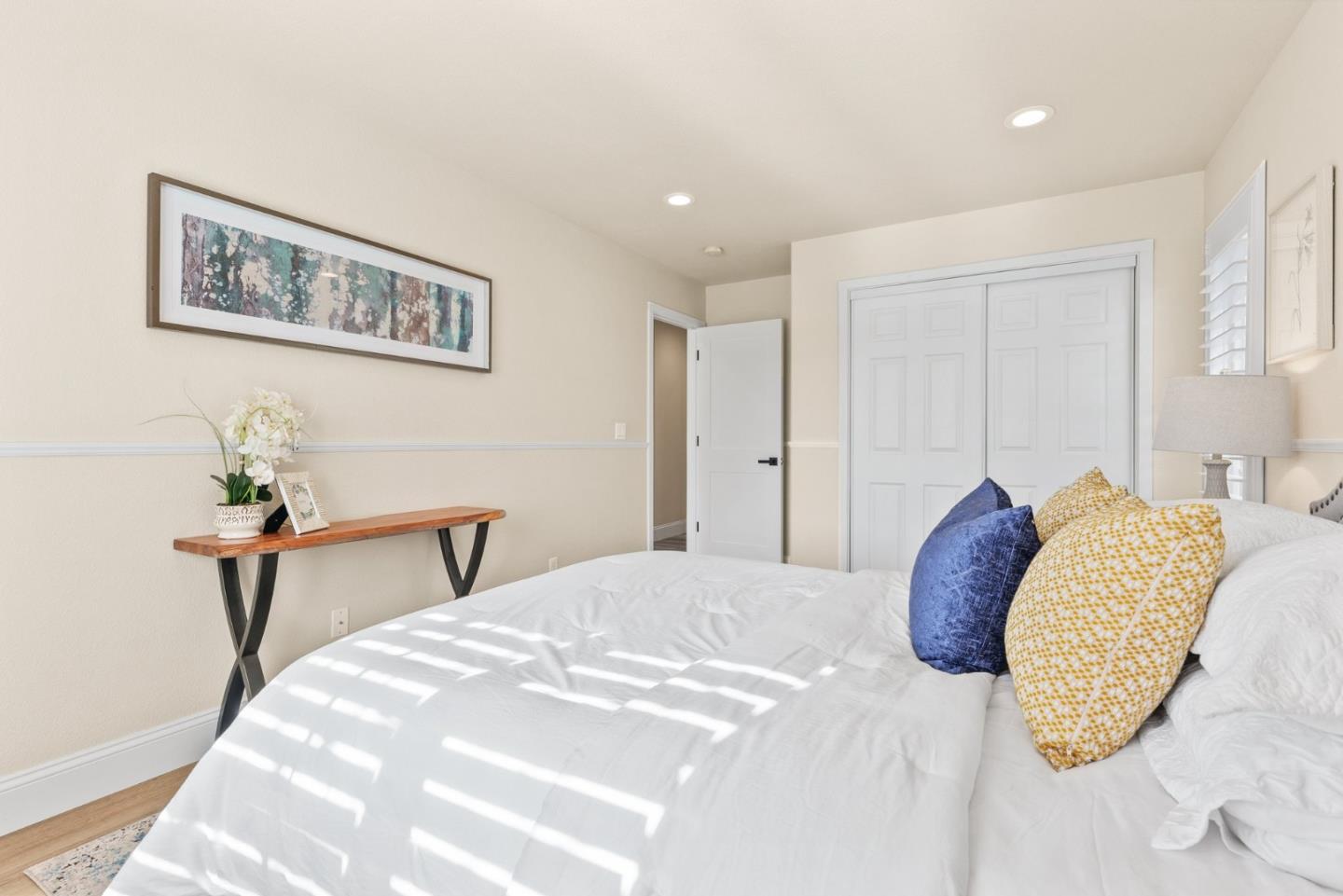 75 Paloma Drive Morgan Hill, CA 95037 - Photo 31 of 53 a bedroom with a bed and a table in it