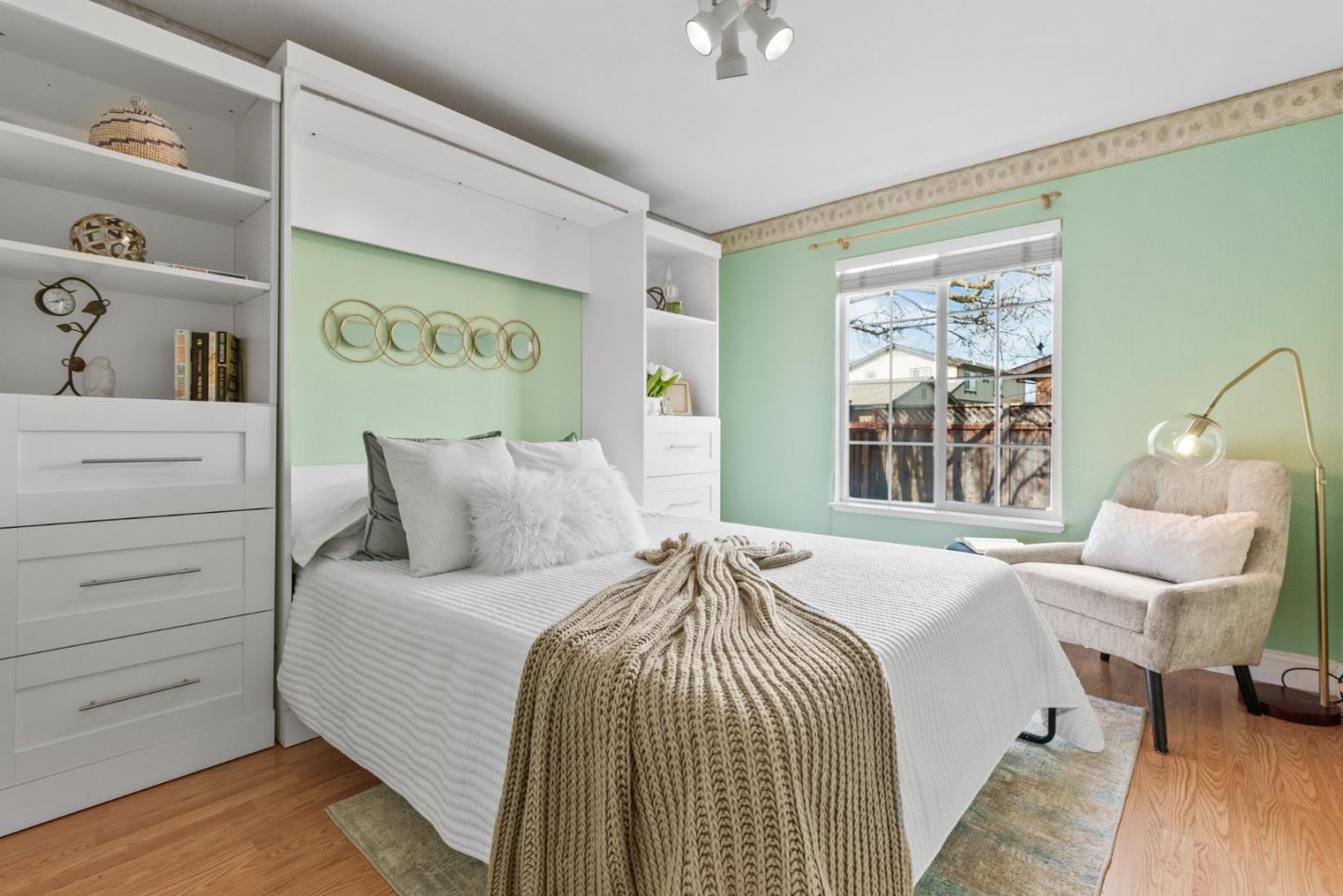 75 Paloma Drive Morgan Hill, CA 95037 - Photo 34 of 53 a bedroom with a bed and wooden floor