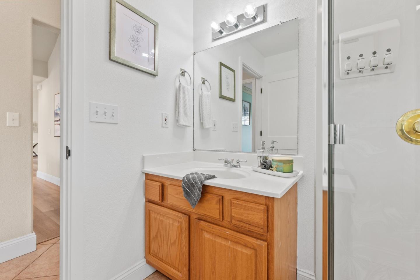 75 Paloma Drive Morgan Hill, CA 95037 - Photo 37 of 53 a bathroom with a sink and a mirror