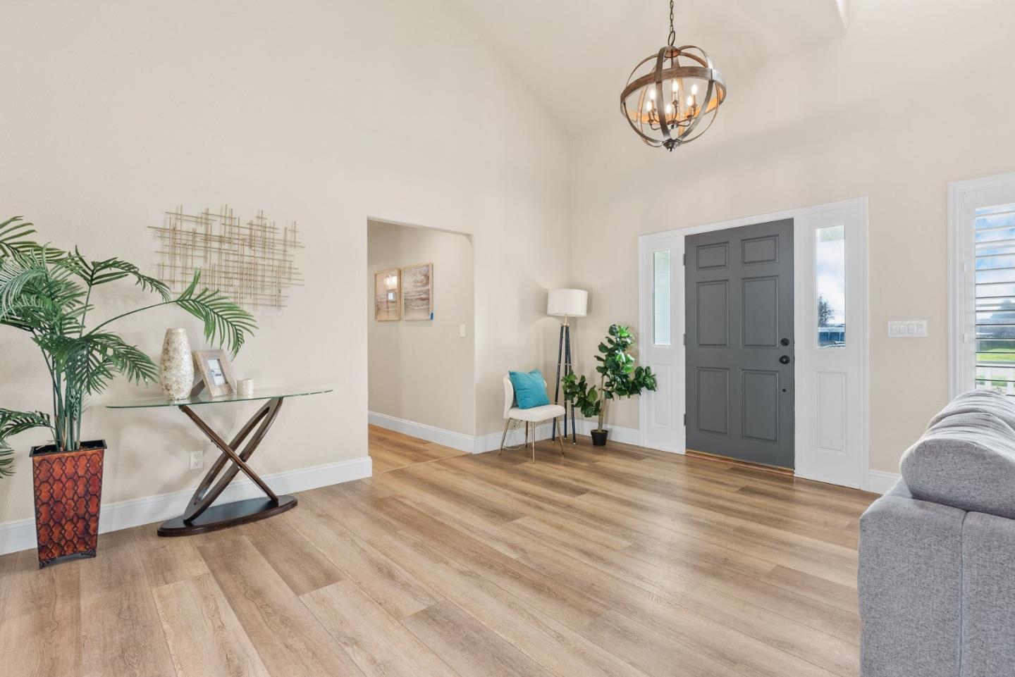 75 Paloma Drive Morgan Hill, CA 95037 - Photo 6 of 53 a view of an empty room with wooden floor and a potted plant