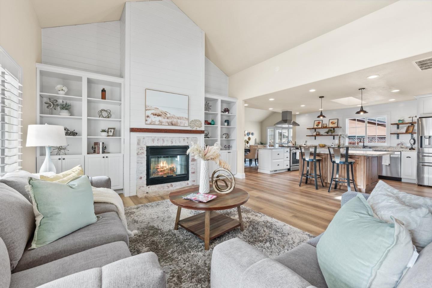 75 Paloma Drive Morgan Hill, CA 95037 - Photo 10 of 53 a living room with furniture a fireplace and a table