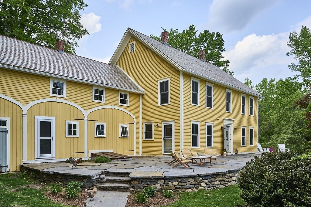 39 Laurel Mountain Road Haydenville, MA 01039 - Photo 1 of 42 a front view of a house with a yard