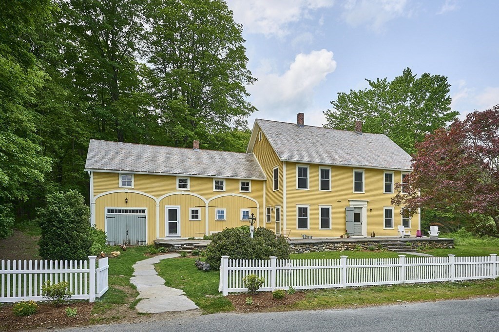 39 Laurel Mountain Road Haydenville, MA 01039 - Photo 2 of 42 a front view of a house with a yard