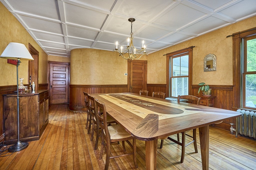 39 Laurel Mountain Road Haydenville, MA 01039 - Photo 7 of 42 a view of a dining room with furniture and chandelier