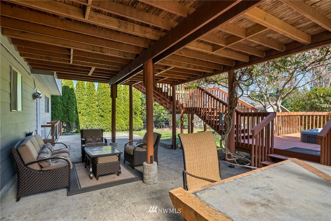 10831 38th Drive Southeast Everett, WA 98208 - Photo 25 of 40 a view of a patio with a table and chairs
