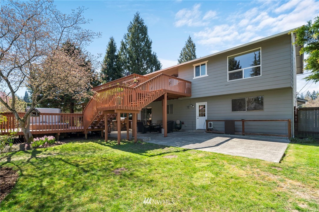 10831 38th Drive Southeast Everett, WA 98208 - Photo 30 of 40 a view of a house with a yard patio and a yard