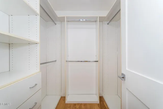 a view of a street with a building in the background