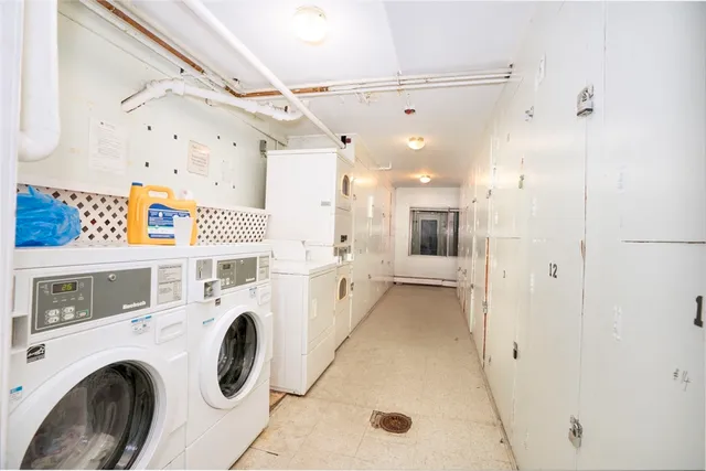 a view of a storage & utility room with washer and dryer