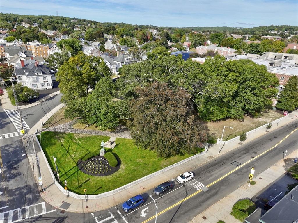 426 Pleasant Street, Unit 17 Malden, MA 02148 - Photo 35 of 36 an aerial view of a residential houses with outdoor space and street view