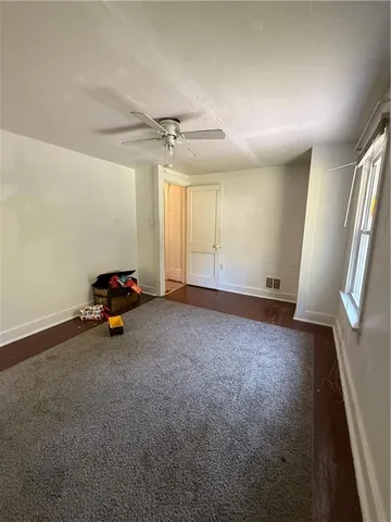 a view of a room with a window